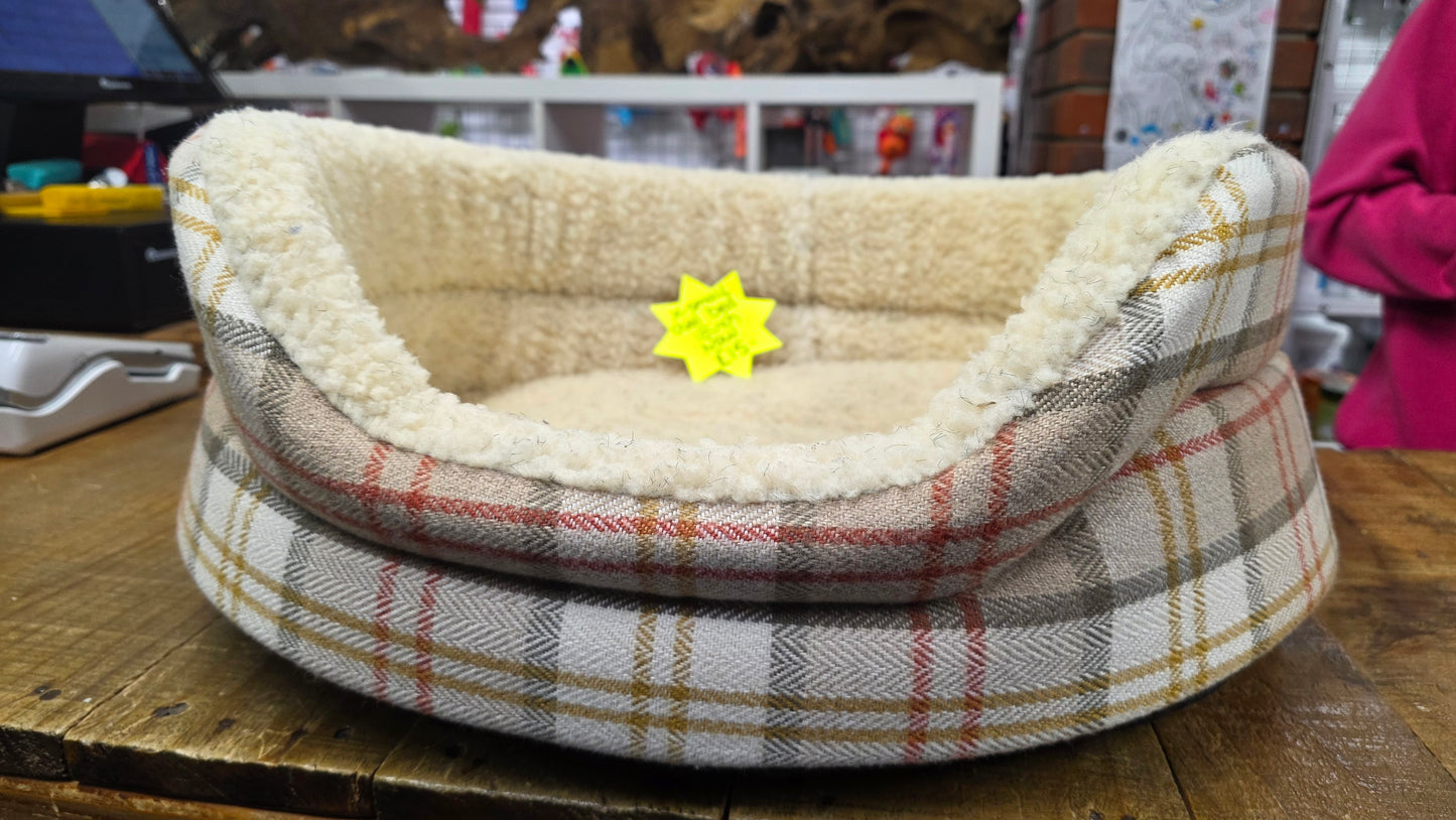 SMALL OVAL TARTAN DOG BED.             ( CLEARANCE )