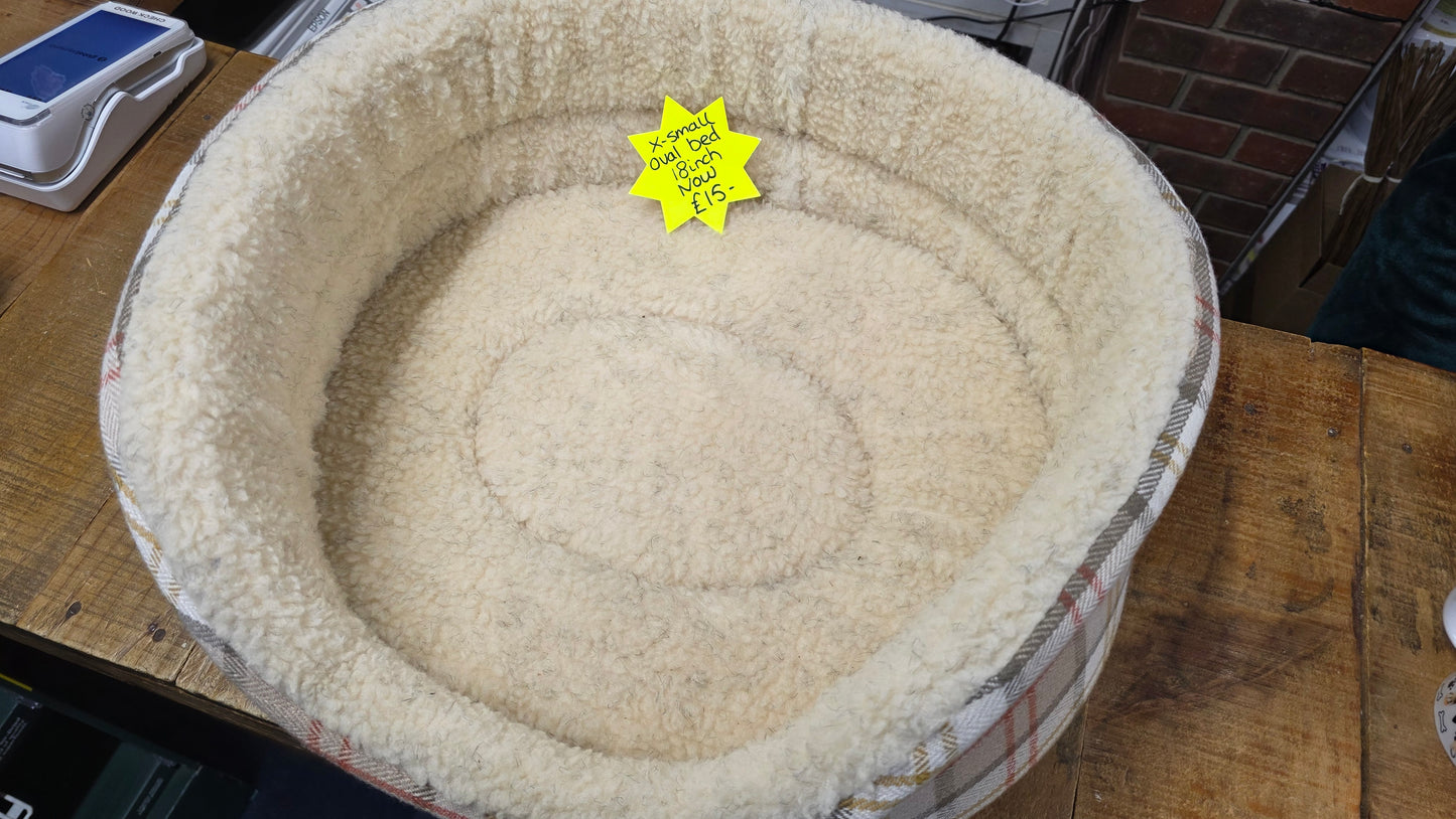 SMALL OVAL TARTAN DOG BED.             ( CLEARANCE )